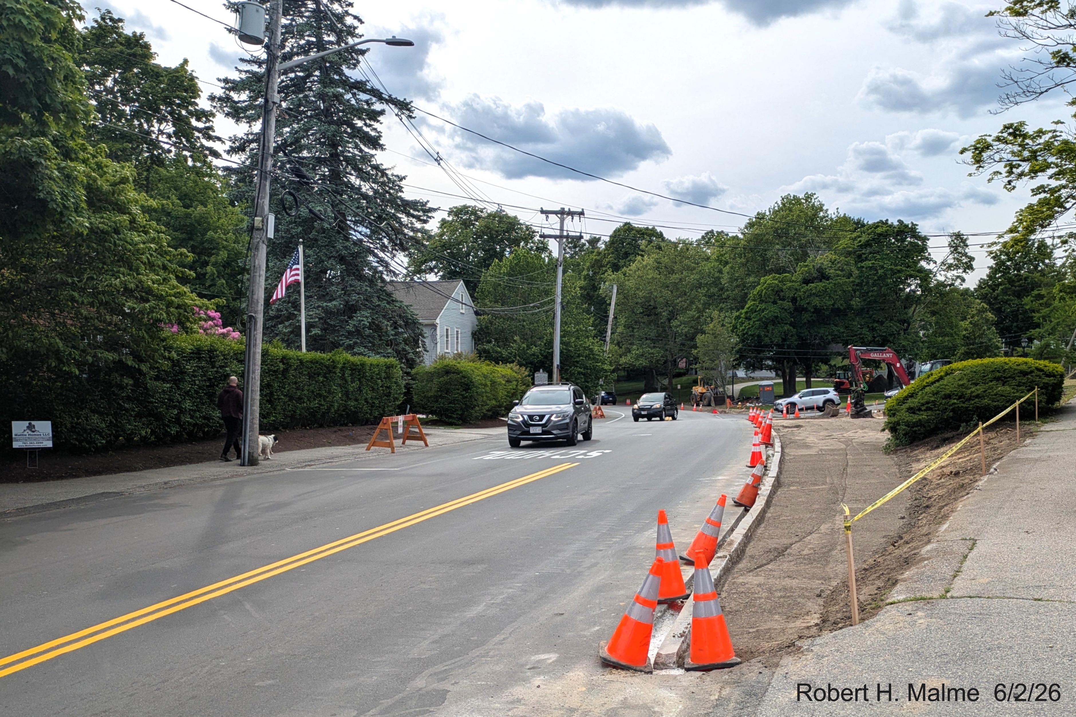 Image of view along North Street showing landscape work and completion of curbing
	installation, June 2026