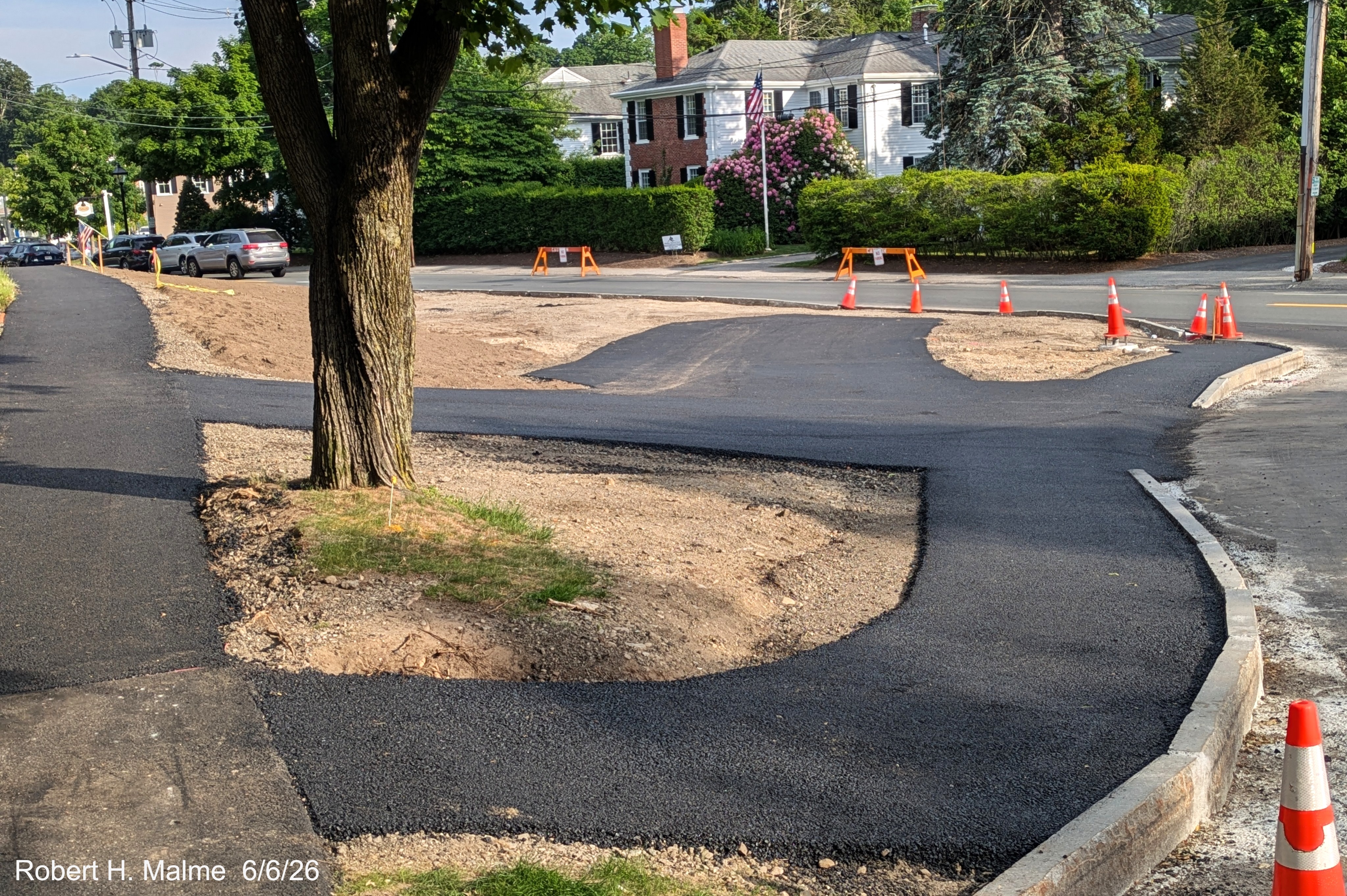 Image of taken along Lincoln Street at the North Street intersection showing the recent
	paving in front of the New North Church, June 2026