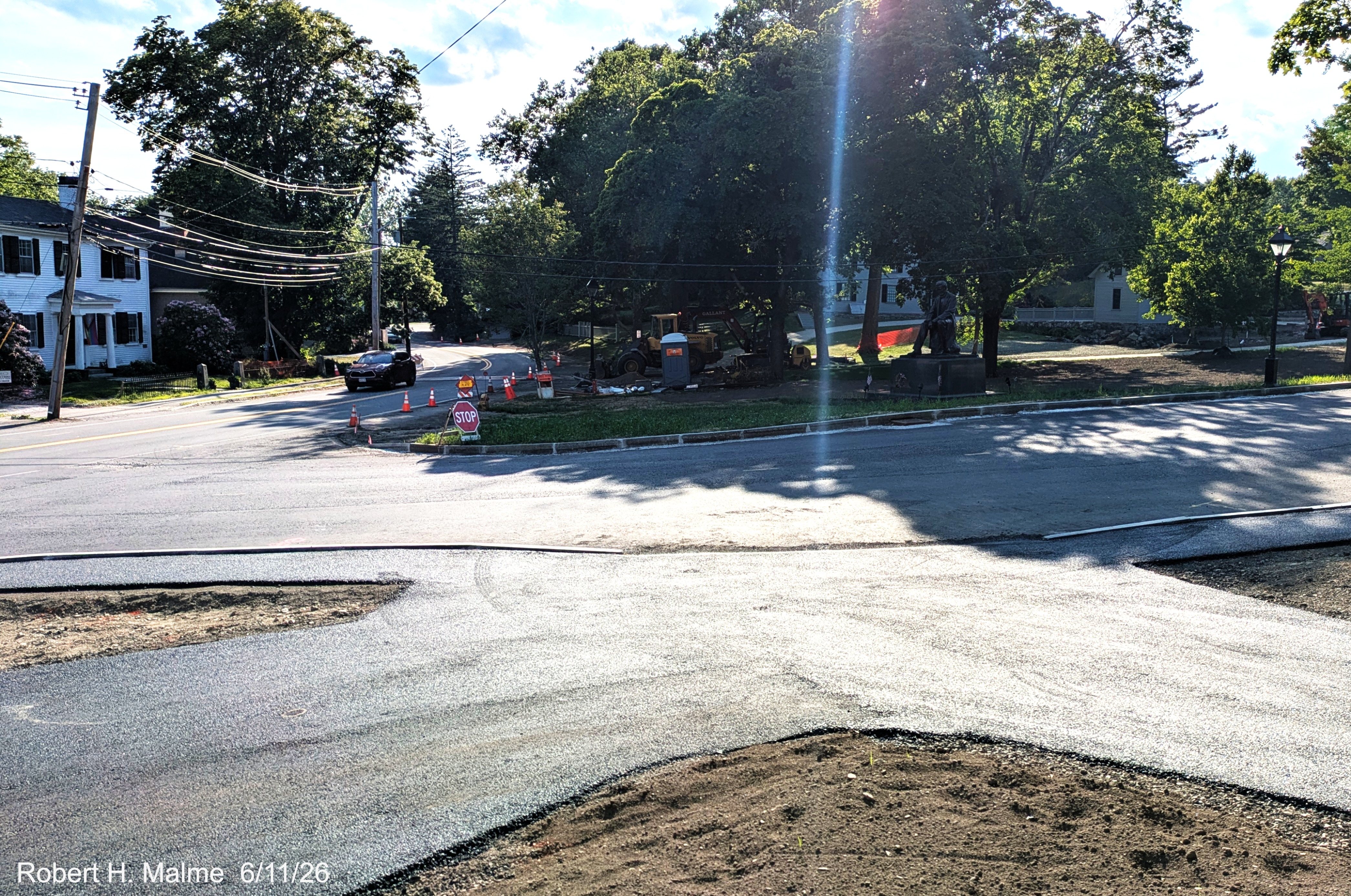 Image of taken at foot of Lincoln Street along North Street, showing parking space work 
	continuing by the Benjamin Lincoln House, June 2026