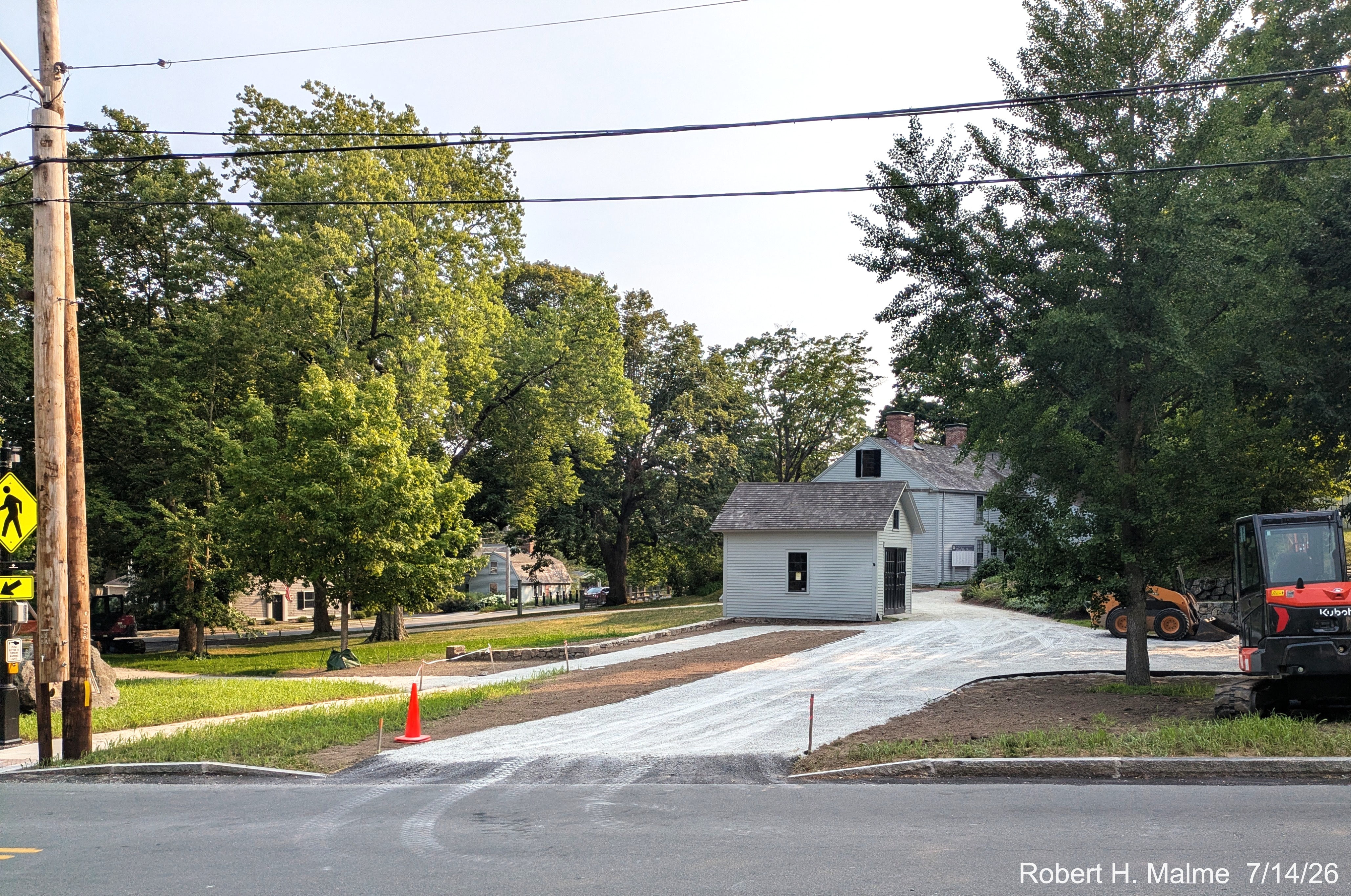 Image taken looking across Lincoln Street at the completed driveway for the Benjamin
	Lincoln House, July 2026