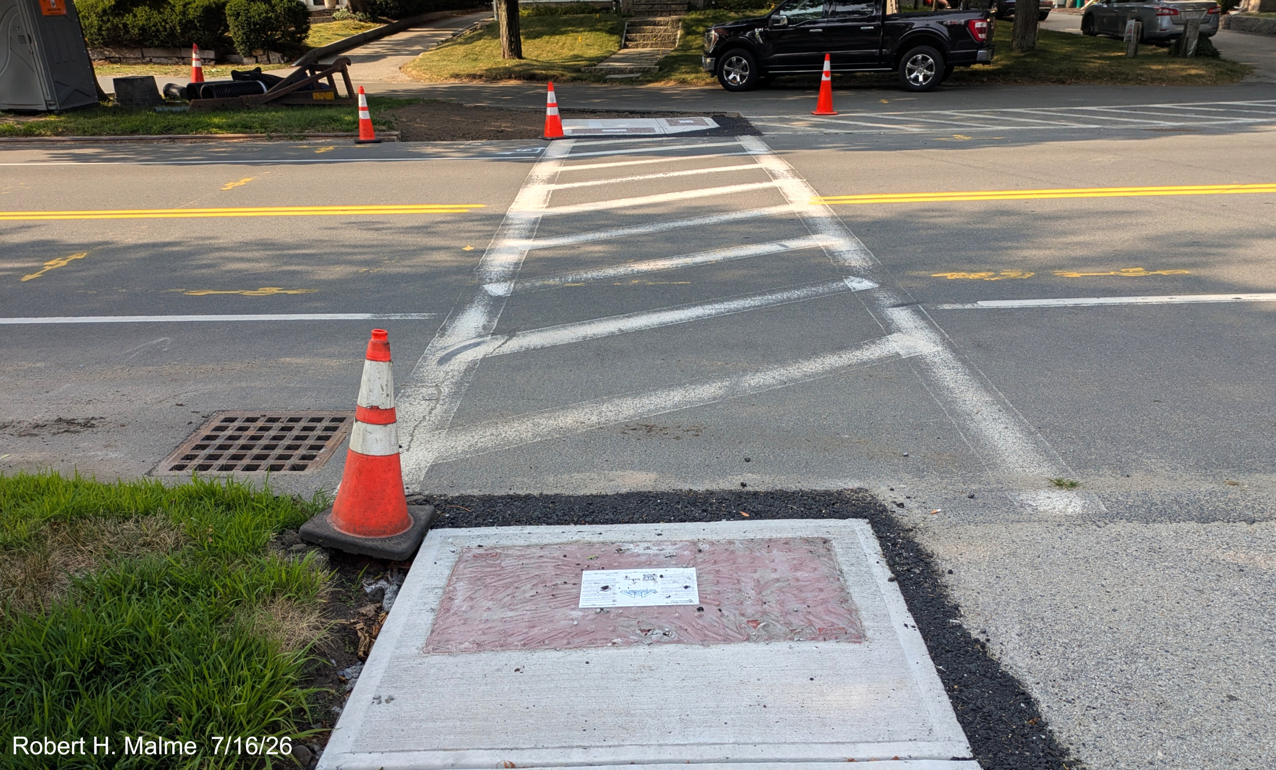 Image taken looking across North Street at accessiblity work being made to crosswalk as 
	part of the	Lincoln Street project, July 2026