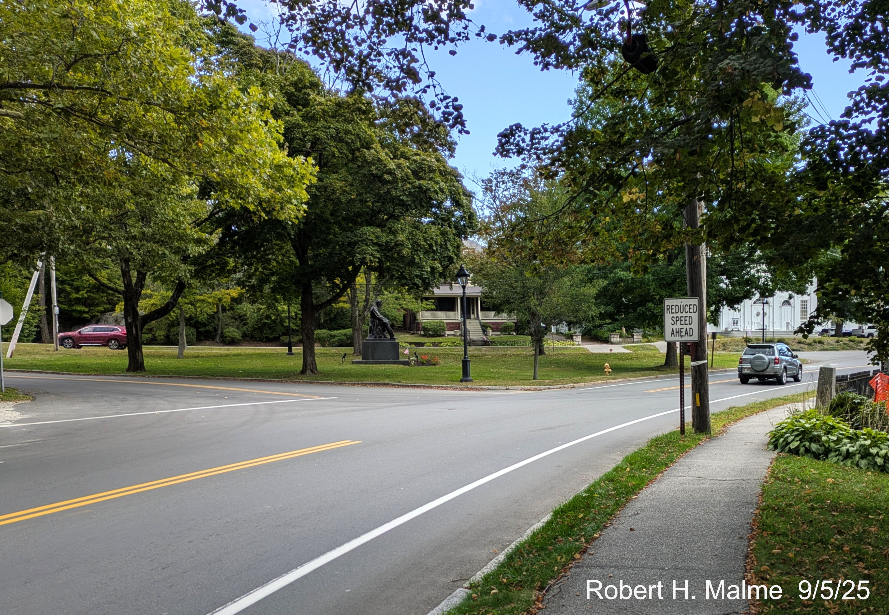 Image of current layout of the intersection of Lincoln and North Streets from North
	Street, the two Lincoln Street intersections in view, August 2025