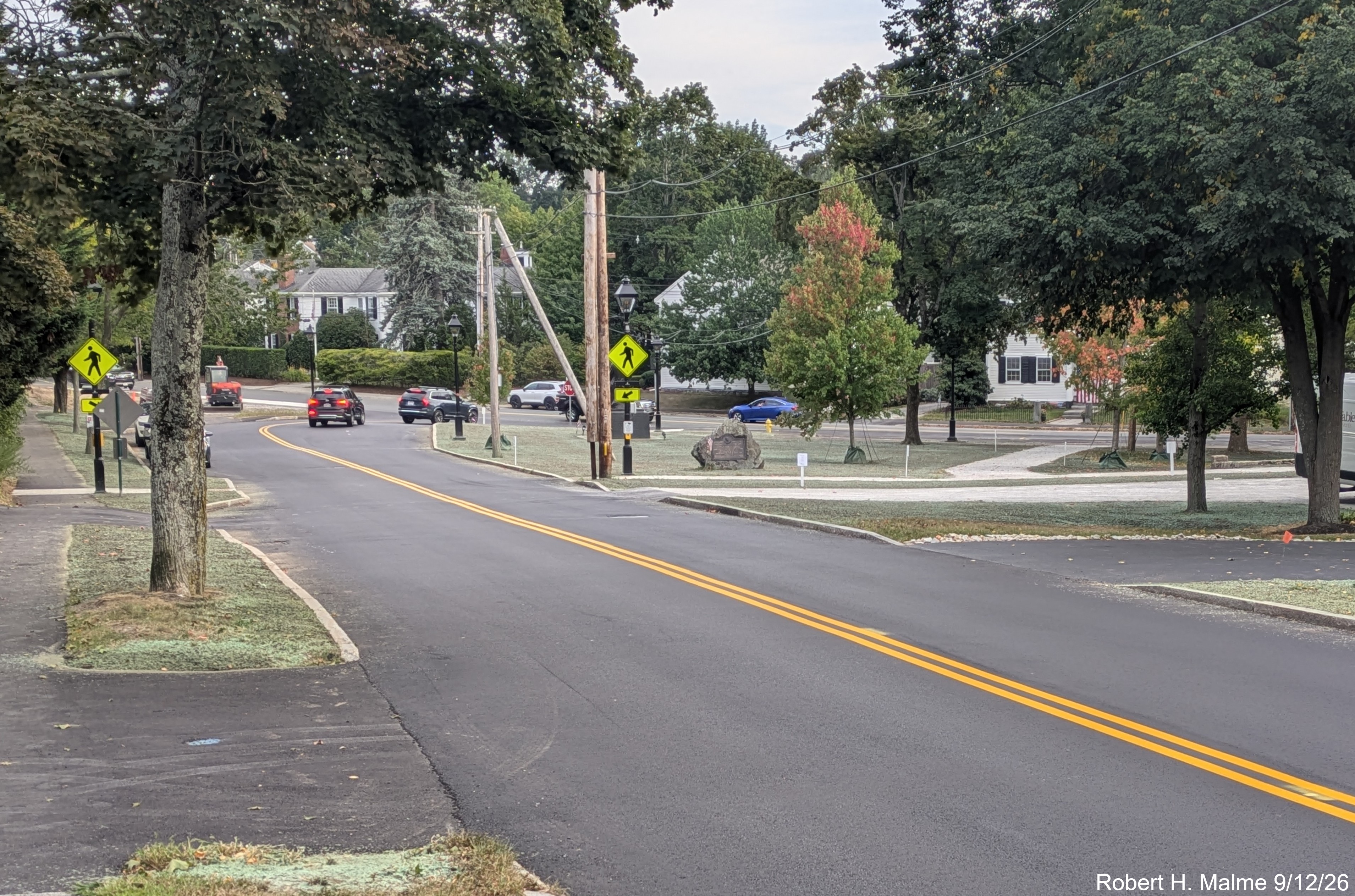 Image taken from Lincoln Street showing reseeding has taken place on Fountain Square 
	lawn while awaiting the final lane striping, September 2026
