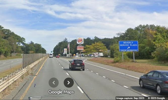 Image of new blue ramp sign for the Beverly Service Plaza on MA 128 North, 
	Google Maps Street View, September 2025