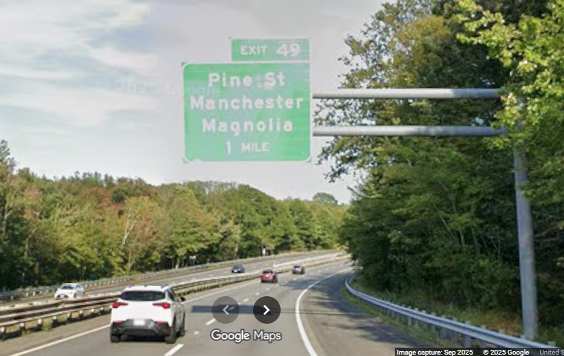Image of new 1 mile advance overhead sign for Pine Street exit on MA 128 North in 
	Manchester-by-the-Sea, Google Maps Street View, September 2025