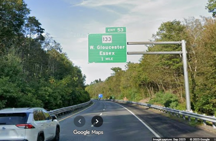 Image of new 1 Mile advance overhead sign for MA 133 exit on MA 128 North in 
	Gloucester, Google Maps Street View, September 2025