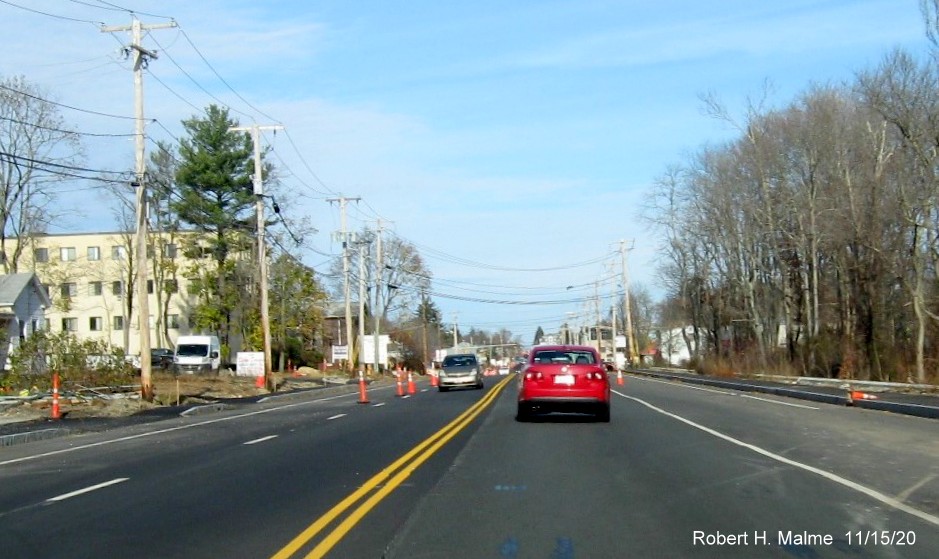 Image of nearly completed widening of MA 18 roadway just north of unfinished commuter railroad bridge in South Weymouth, November 2020