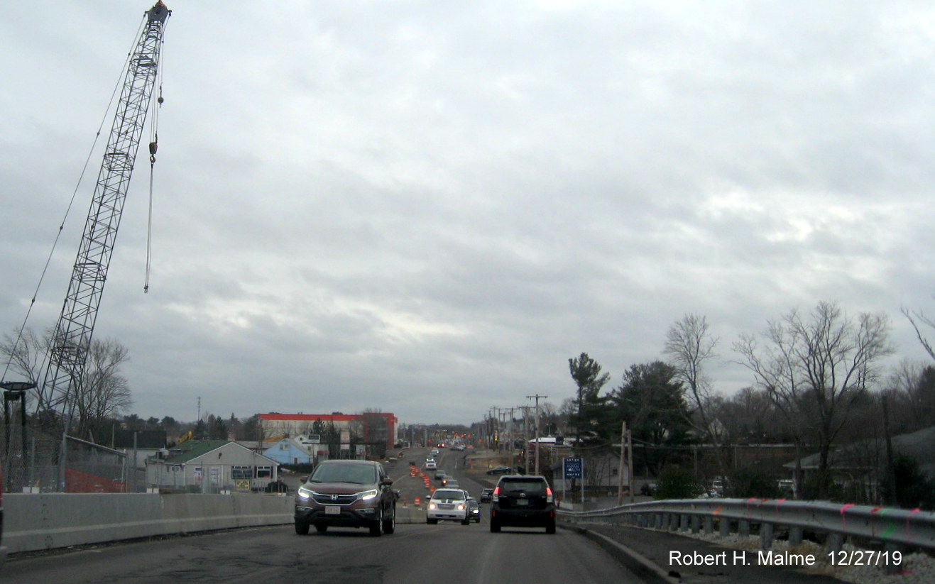 Image taken on MA 18 South from top of South Weymouth Commuter Railroad Bridge showing widening project on east side of bridge continuing in Dec. 2019