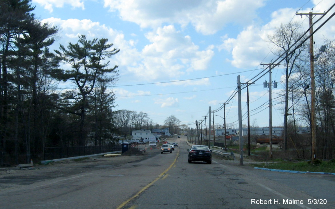 Image of progress widening MA 18 North in northern Abington, showing old utility poles still in right of way, May 2020