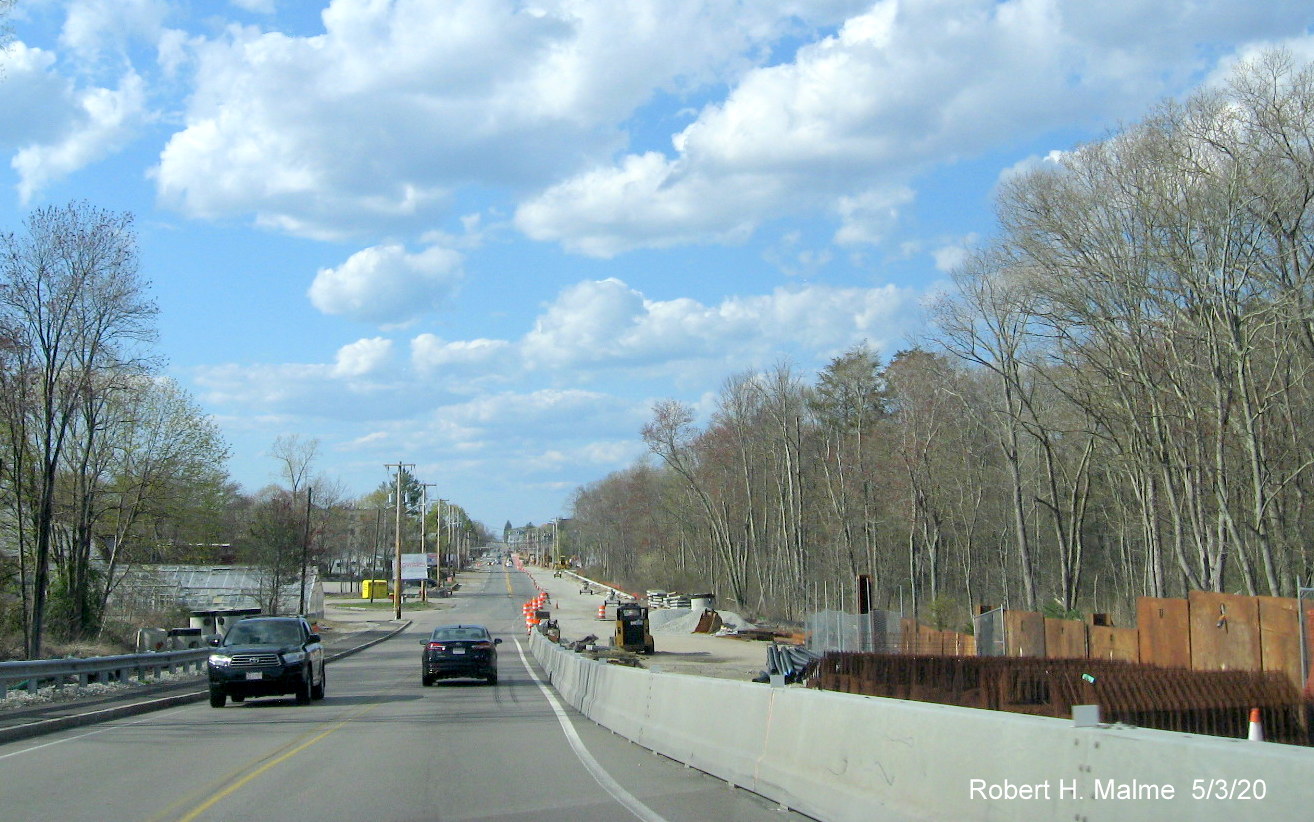 Image of view from commuter railroad bridge of new MA 18 North lane awaiting paving later in May, May 2020