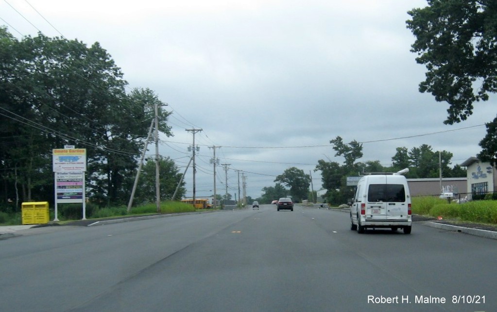 Image of traffic on MA 18 South along final paved lanes awaiting final striping in Abington, August 2021