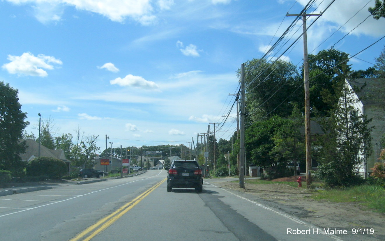 Image of traffic along MA 18 South beyond MA 58 intersection in MassDOT widening project work zone in South Weymouth