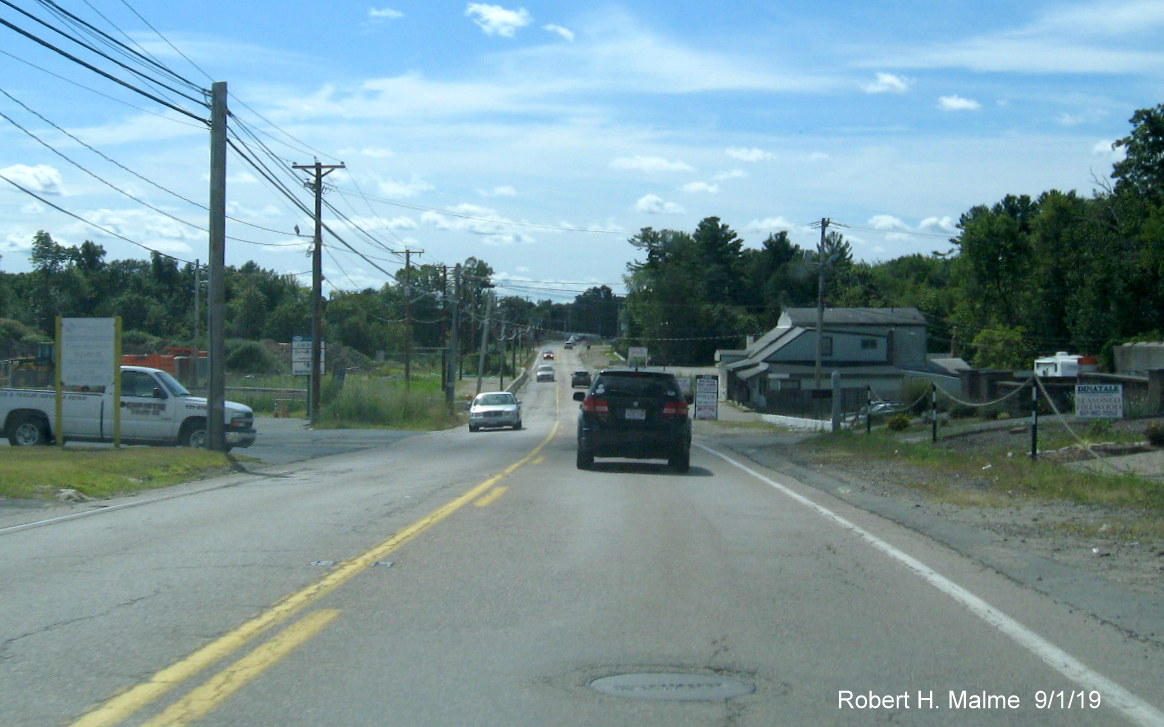 Image of traffic on MA 18 South traveling through MassDOT widening project work zone in Abington