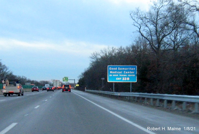 Image of hospital auxiliary sign for MA 27 North exit with new milepost based exit number 
                                       on MA 24 South in Brocktom, January 2021