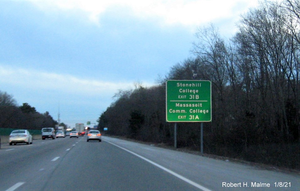 Image of auxiliary sign for MA 123 exits with new milepost based exit numbers 
                                      on MA 24 South in Brockton, January 2021