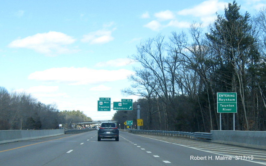 Image of new rover crossing and town line sign for the Taunton River and Raynham on MA 24 North prior to US 44 exit.
