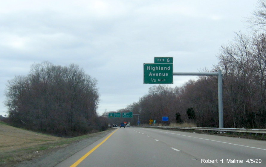 Image of recently placed 1/2 mile advance overhead sign for the Highland Avenue exit on MA 24 South in Fall River, taken April 2020