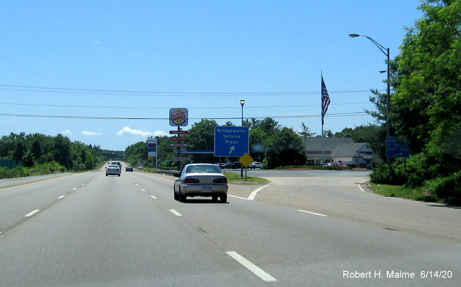 Image of recently placed mixed case ground mounted service area guide sign on MA 24 South in Bridgewater between the 2 I-495 ramps, taken June 2020