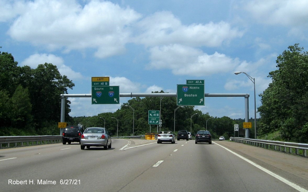 Image of newly placed stacked gore signs for I-93/US 1 exit ramps with new milepost based exit numbers at end of MA 24 North in Randolph, June 2021