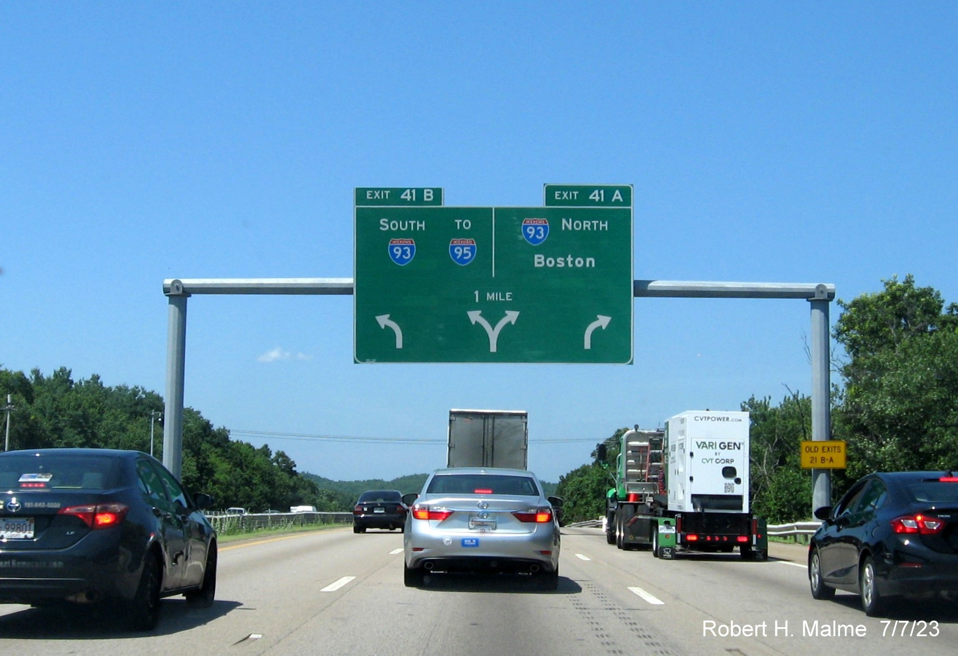 Image of 1 mile advance arrow-per-lane sign for I-93 exits with removed yellow Left Exit tab for I-93 South on MA 24 North in Randolph, July 2023