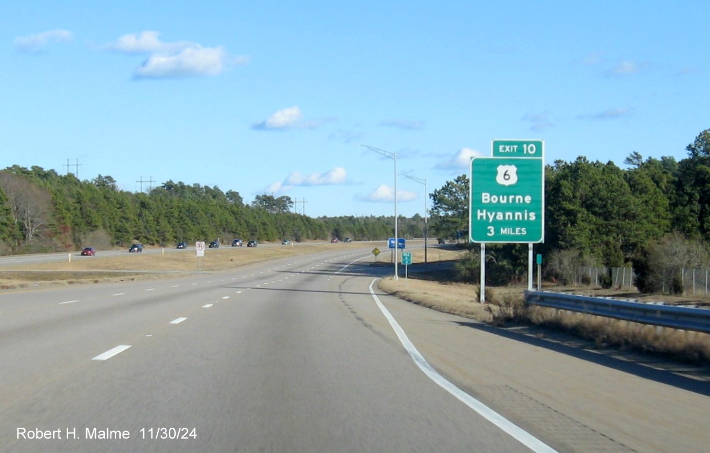 Image of ground mounted 3 Miles advance sign for US 6 Bourne exit on MA 25 East in Plymouth, November 2024