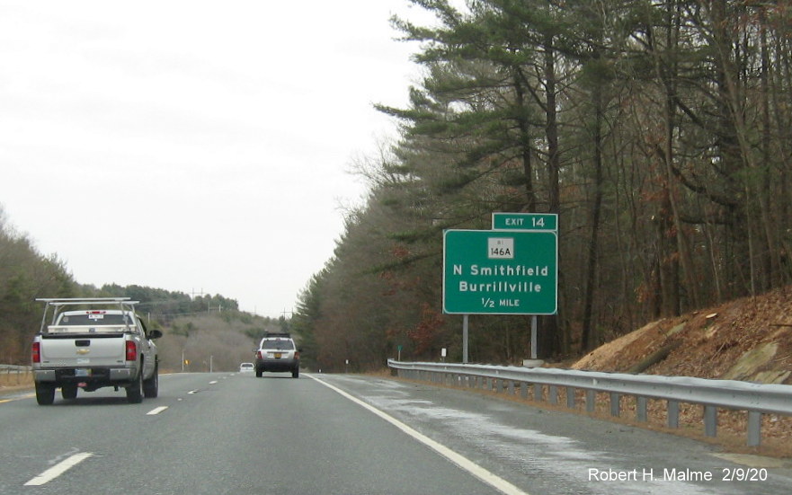 Image of ground mounted 1/2 mile advance sign with new milepost based exit number for RI 146A exit on RI 146 South in North Smithfield