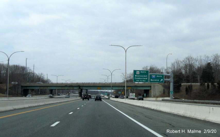 Image of new milepost exit number sign on support posts for overhead signs at ramp to I-295 South on RI 146 North in Lincoln