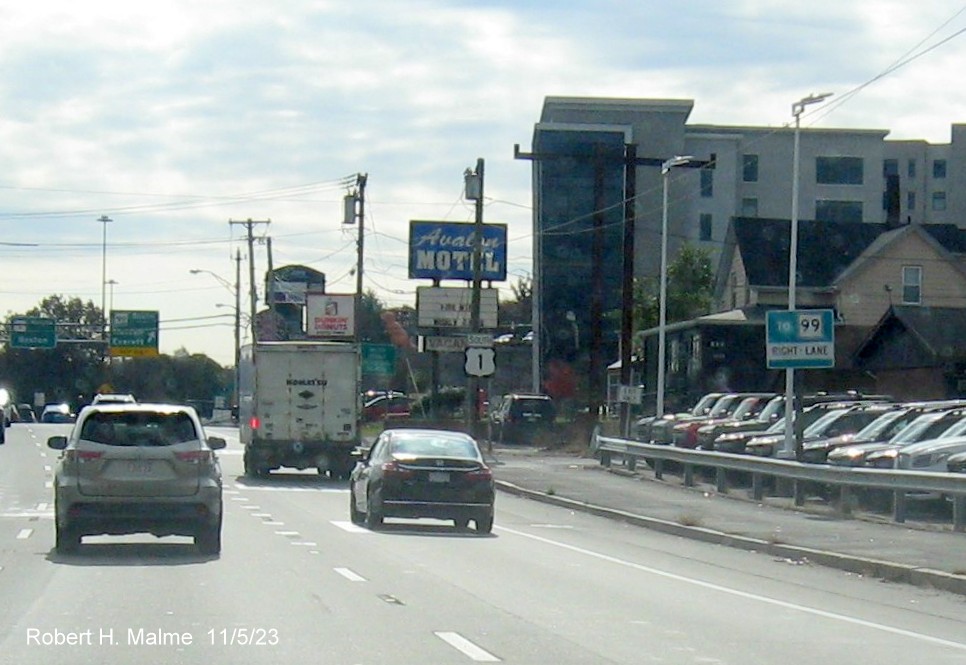 Image of ground mounted 1/4 mile advance sign for the MA 99 exit on US 1 South in Malden, November 2023