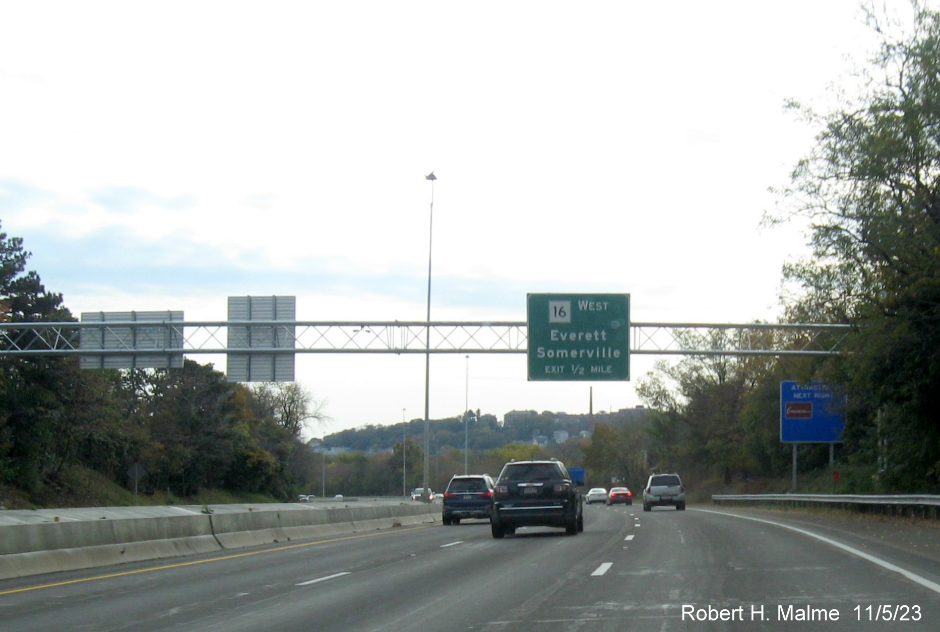 Image of recently placed 1/2 mile advance overhead sign for MA 16 exit on US 1 South in Everett, November 2023