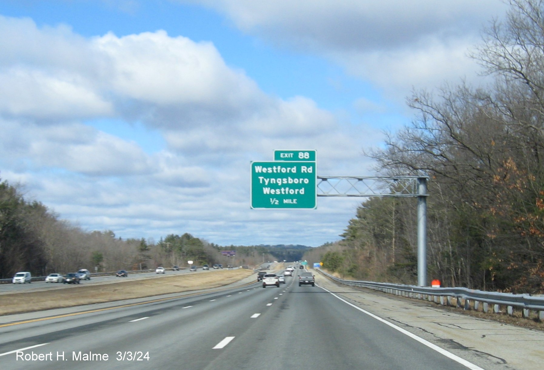 Image of recently placed 1/2 mile advance overhead sign for the Westford Road exit on US 3 North in Tyngsboro, March 2024