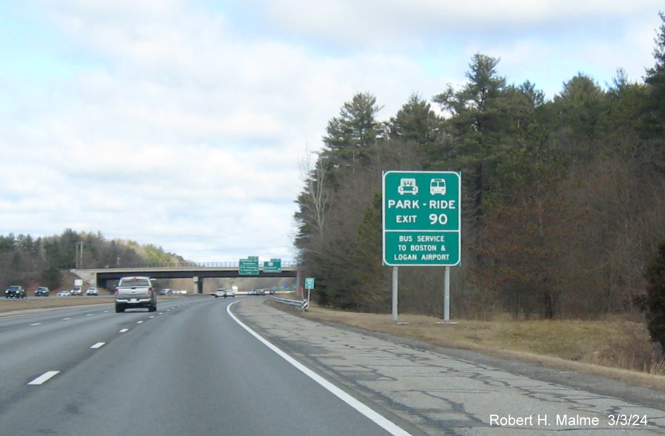 Image of recently placed auxiliary sign for MA 113 exit on US 3 North in Tyngsboro, March 2024