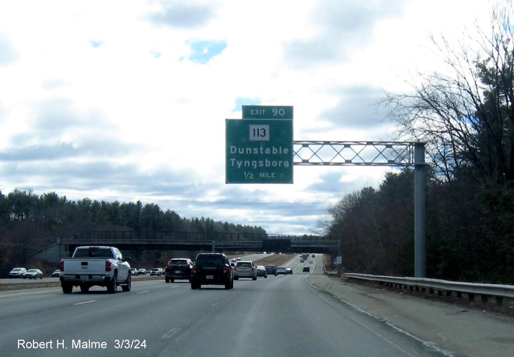 Image of recently placed 1/2 mile advance sign for MA 113 exit on US 3 South in Tyngsboro, March 2024