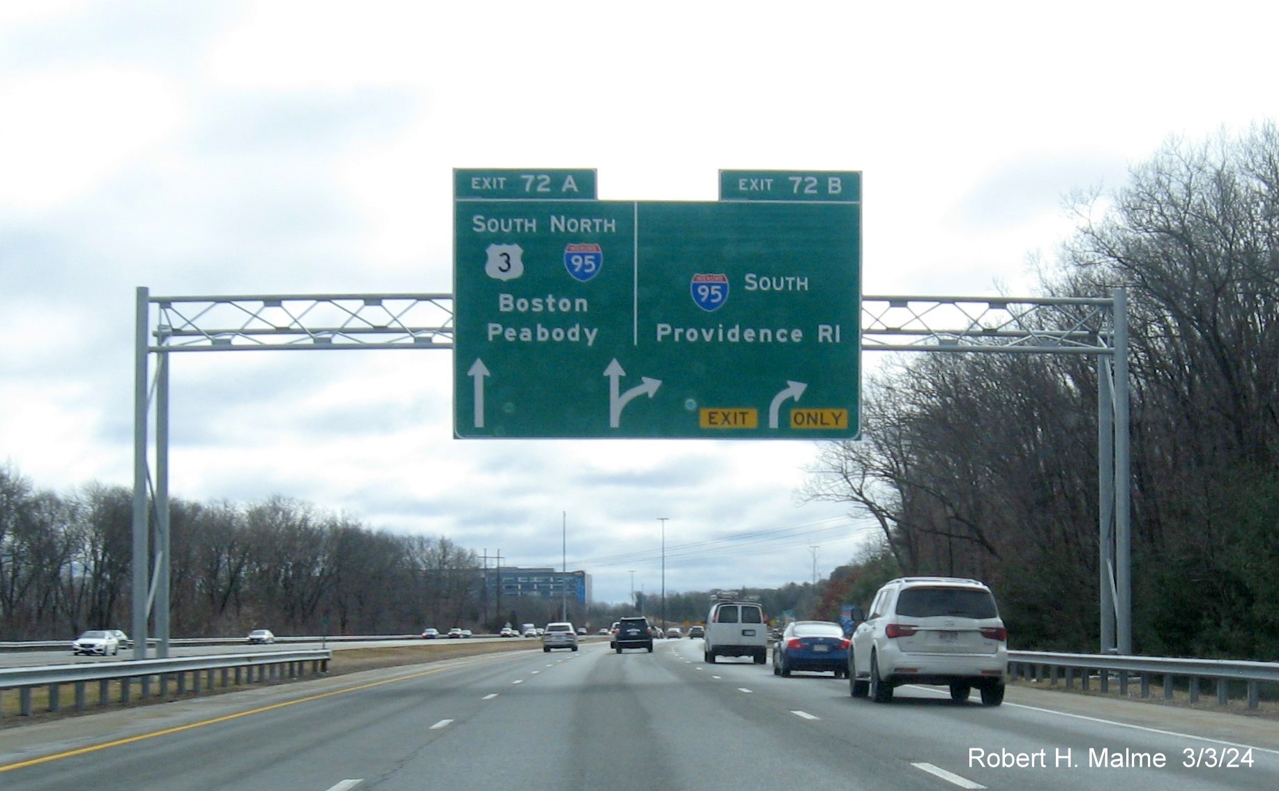 Image of newly placed overhead arrow-per-lane signs at ramp for I-95 South exit on US 3 South in Burlington, March 2024