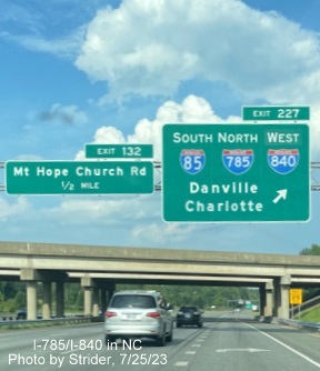 Image of newly updated overhead ramp sign for north segment of Greensboro Loop on I-40 East, 
         now with I-840 shield, photo by Strider, July 2023
