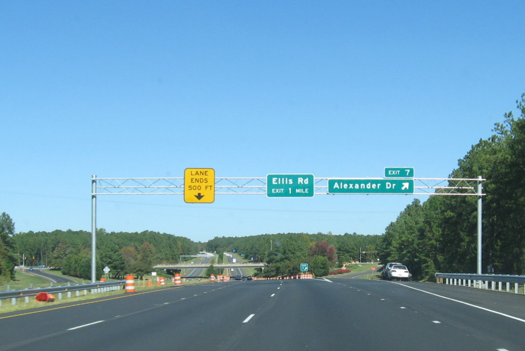 Image of overhead exit signage approaching Alexander
Drive on the Durham Freeway, Oct. 2011