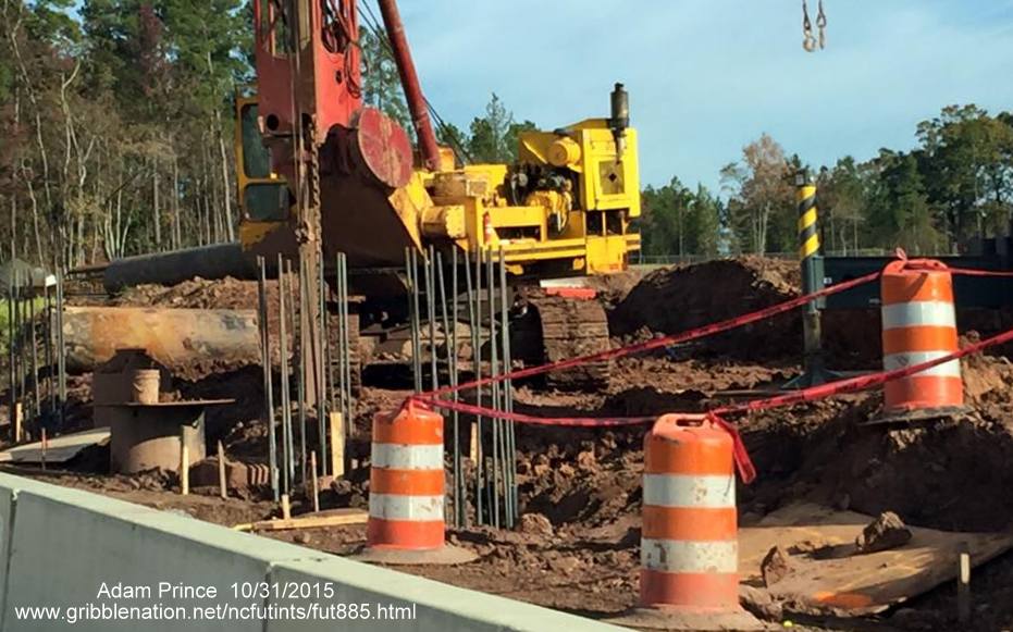 Image of support posts being constructed at future I-885/NC 147 interchange. Photo by Adam Prince
