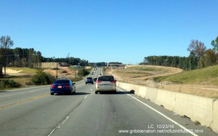 Image from US 70 West prior to future interchange with East End Connector, under construction in Durham, from LC