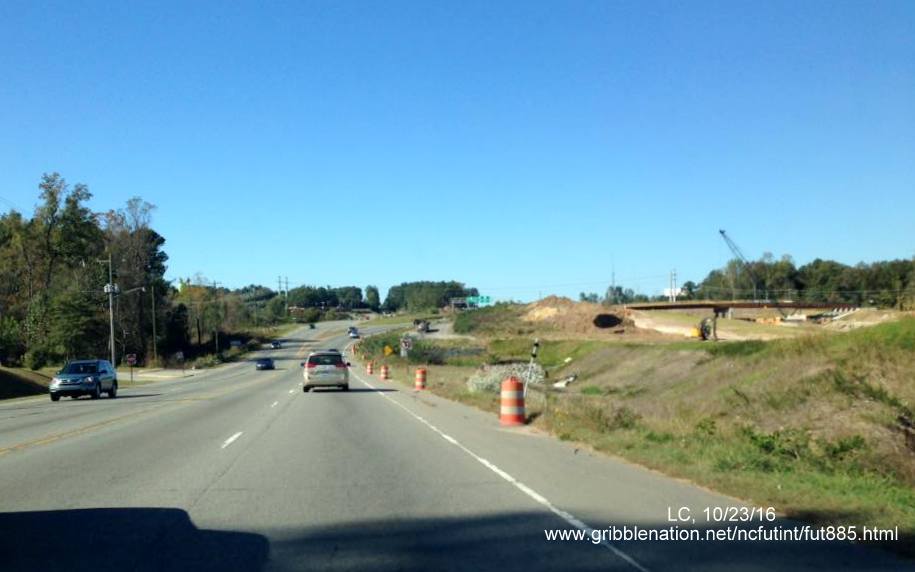 Image of new US 70 freeway being constructed next to current roadway for East End Connector project, from LC