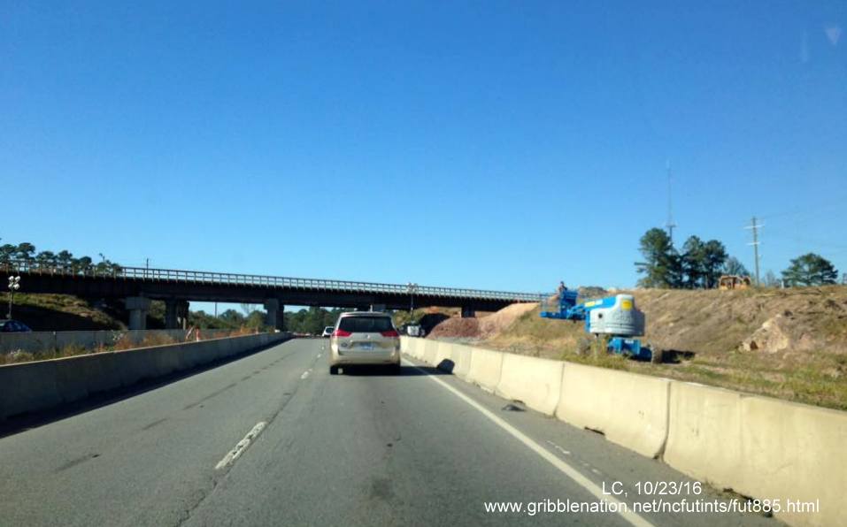 Image of new bridge being built over future US 70 freeway, part of East End Connector project in Durham, by LC