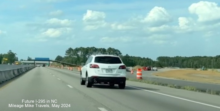 Image of nearly completed ramp from I-95 North to NC 295 (Future I-295) North 
	  in St. Pauls, screen grab from Mileage Mike Travels video, May 2024