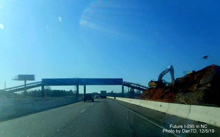 Image of conveyor belt system over I-95 South lanes to carry excavated 
      material from Future I-295 interchange over highway, in Wikimedia by DanTD