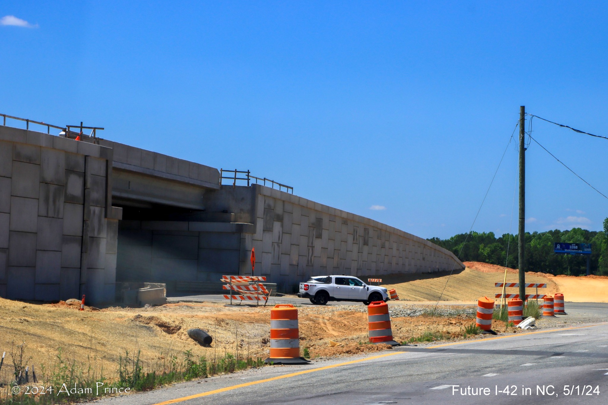 Image of future I-42 bridge from US 70 (Future I-42) West at Wilson's Mills Road
intersection, by Adam Prince, May 2024