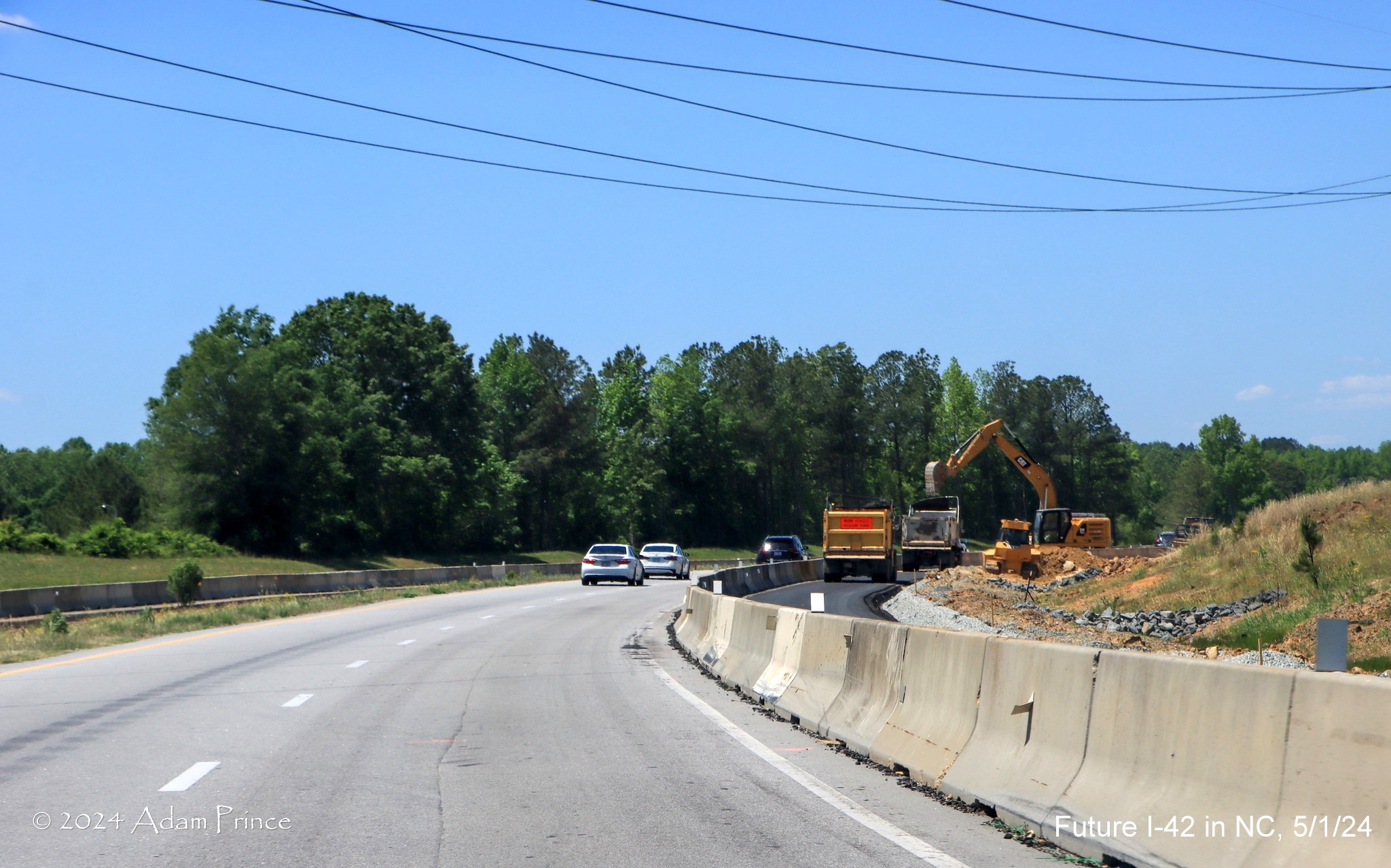 Image of US 70 (Future I-42) West traffic approaching interchange being built at the Swift Creek Road
intersection, by Adam Prince, May 2024