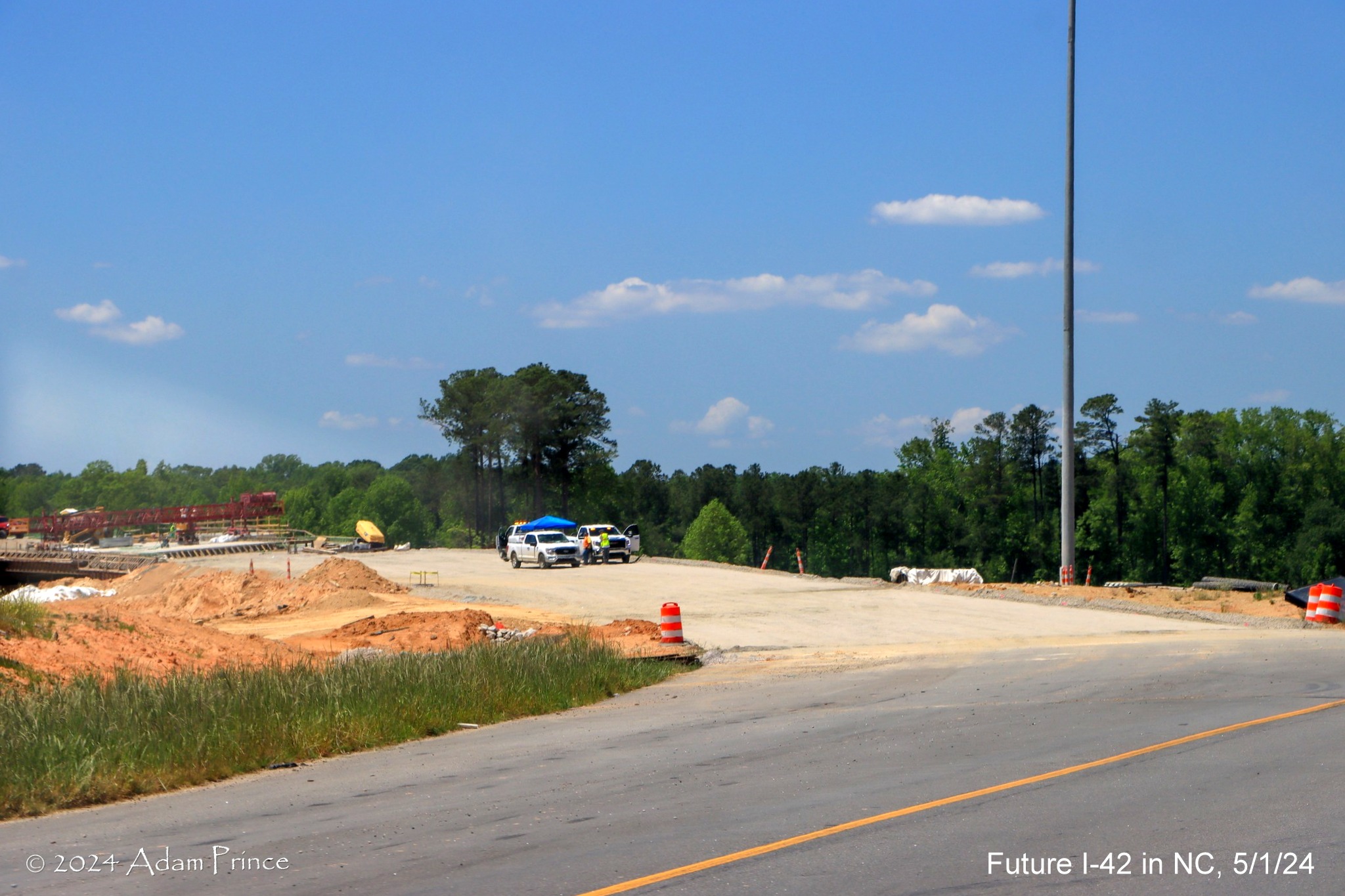 Image of future ramp to I-40 East, NC 540 West from US 70 (Future I-42) West lanes in the
I-40/NC 540 turbine interchange ramps, by Adam Prince, May 2024