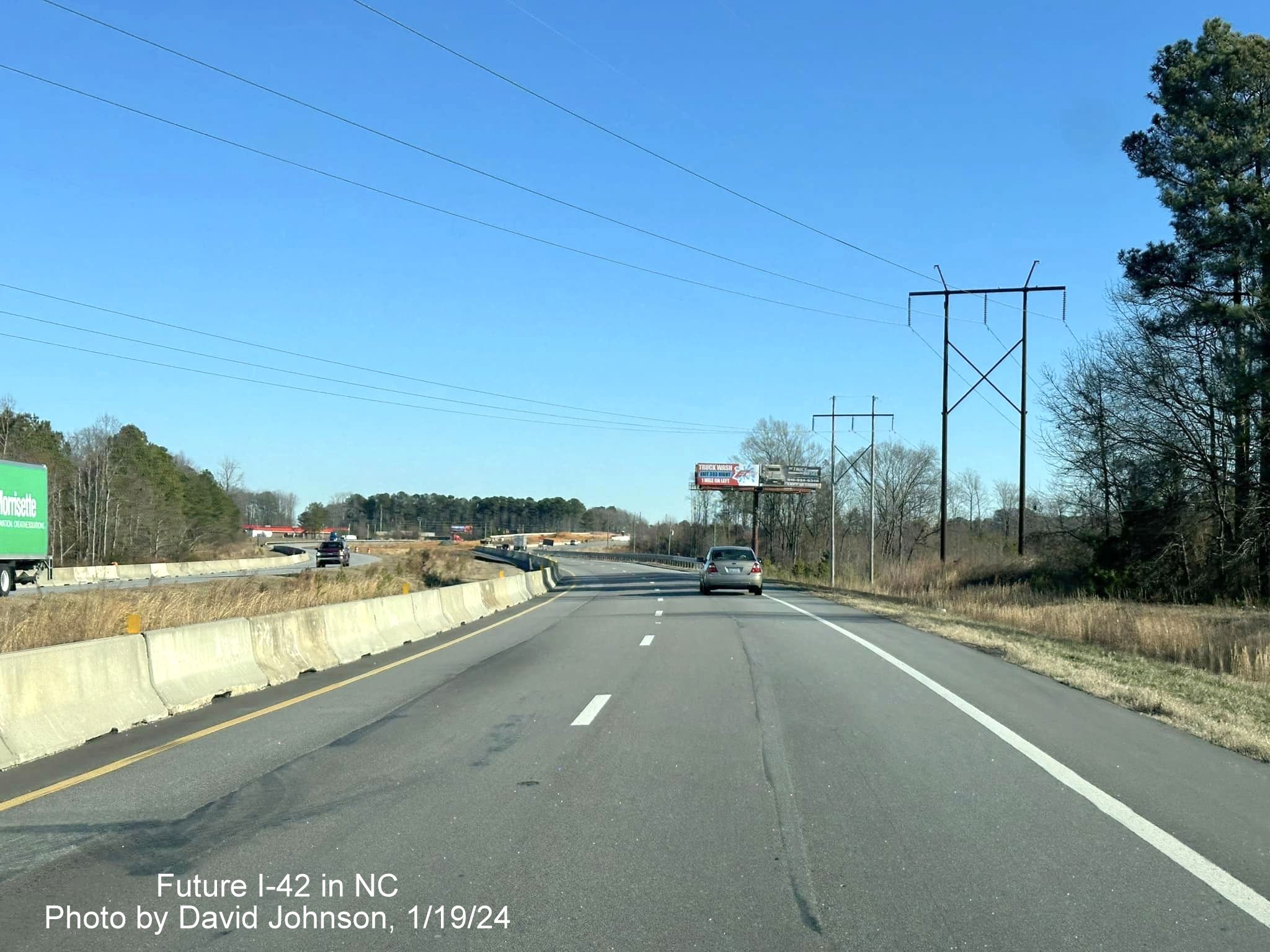 Image of traffic on US 70 (Future I-42) East approaching the future Wilson's Mills Road exit in Johnston
County construction zone, photo by David Johnson, January 2024