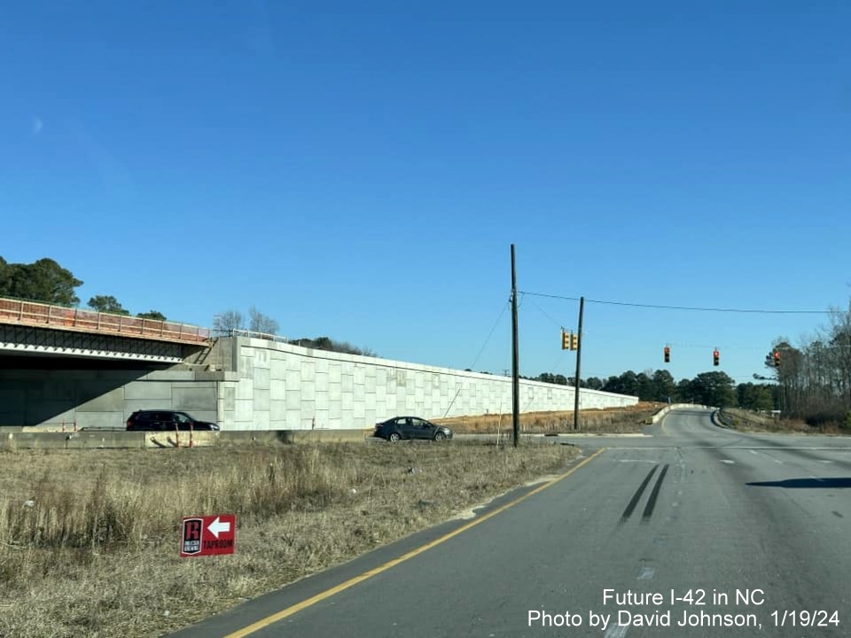 Image of US 70 East roadway at current intersection with future Wilson's Mills Road interchange in Johnston
County work zone, photo by David Johnson, January 2024