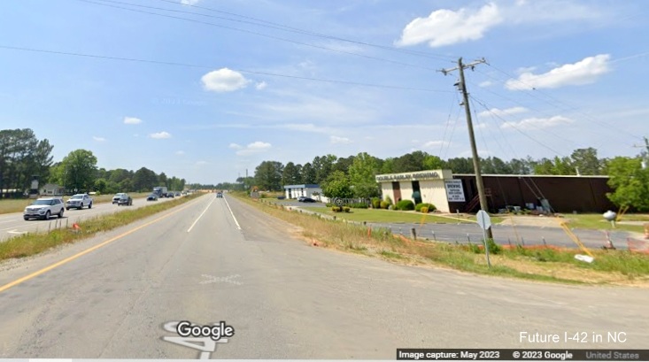 Image of buildings at Bear Farm Road intersection still standing in future I-42 West roadway along US 70 West in Smithfield, Google Maps Street View, May 2023