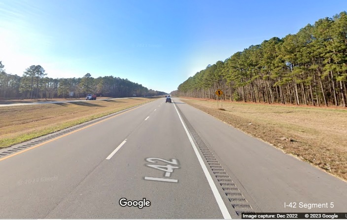 Image of Future I-42 sign on US 70 West at start of interstate grade freeway in New Bern, Google Maps Street View image, December 2022