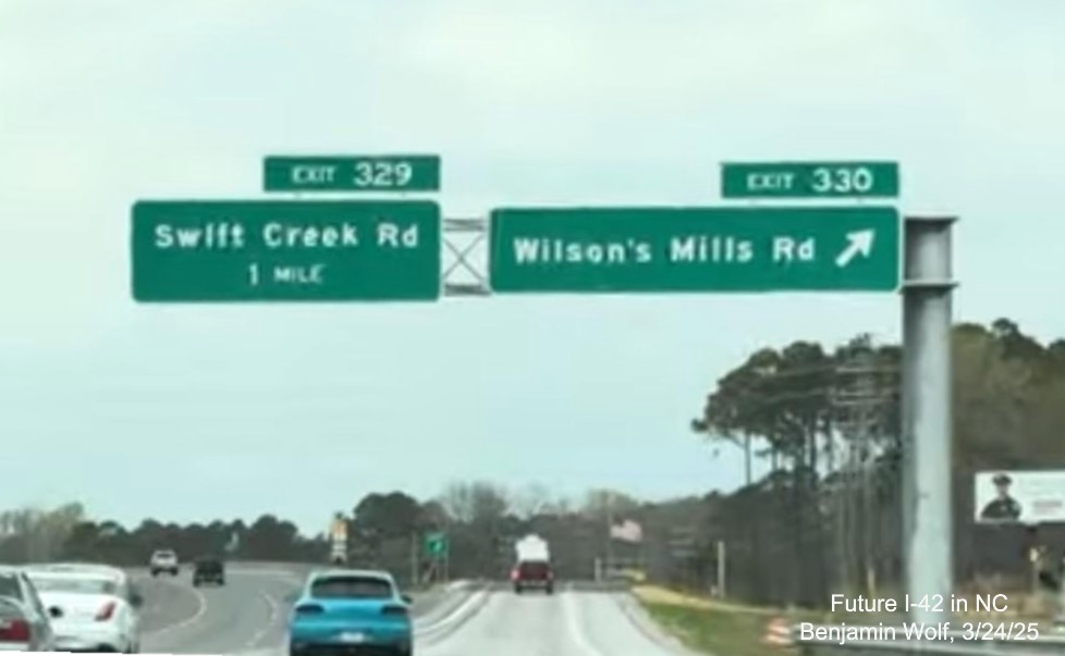 Screen grab of new overhed signage on US 70 (Future I-42) West at the Wilson's Mills
Road interchange in Johnston County, from video by Benjamin Wolf, March 2025 2024