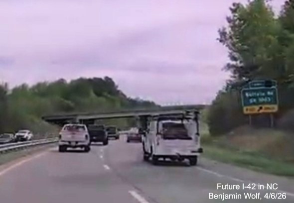 Image of overhead signage for US 70 West exit at start of Bypass US 70 (Future I-42
	West) in Selma,	screen grab from Benjamin Wolf video, December 2025